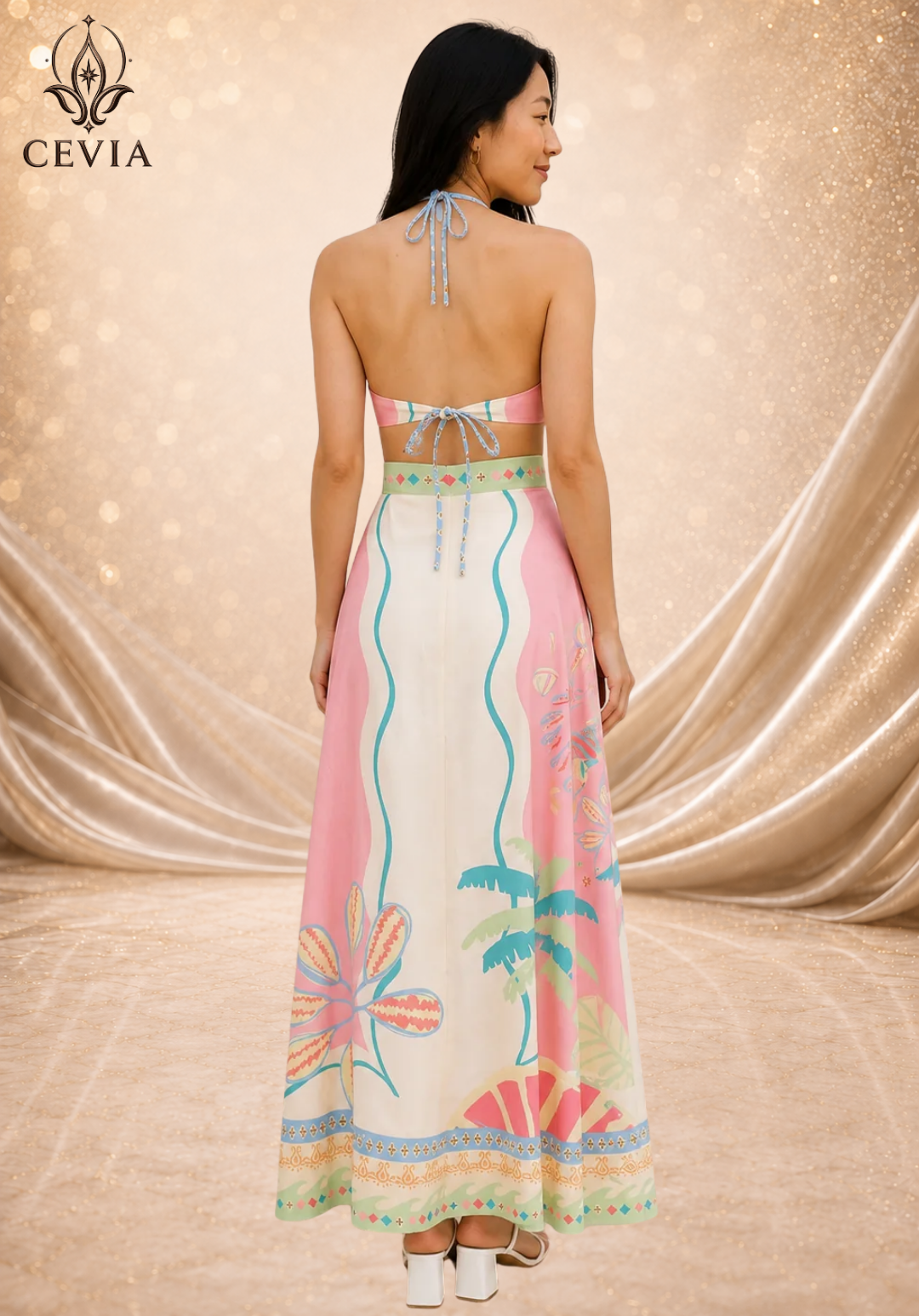 The Backless Halter Cutout Maxi Dress