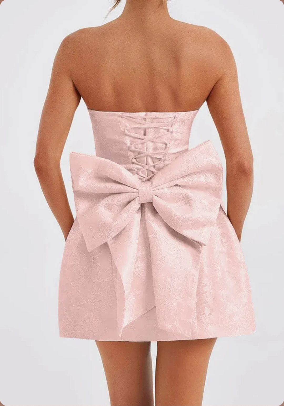 The Rosabella Bow-Back Mini Dress