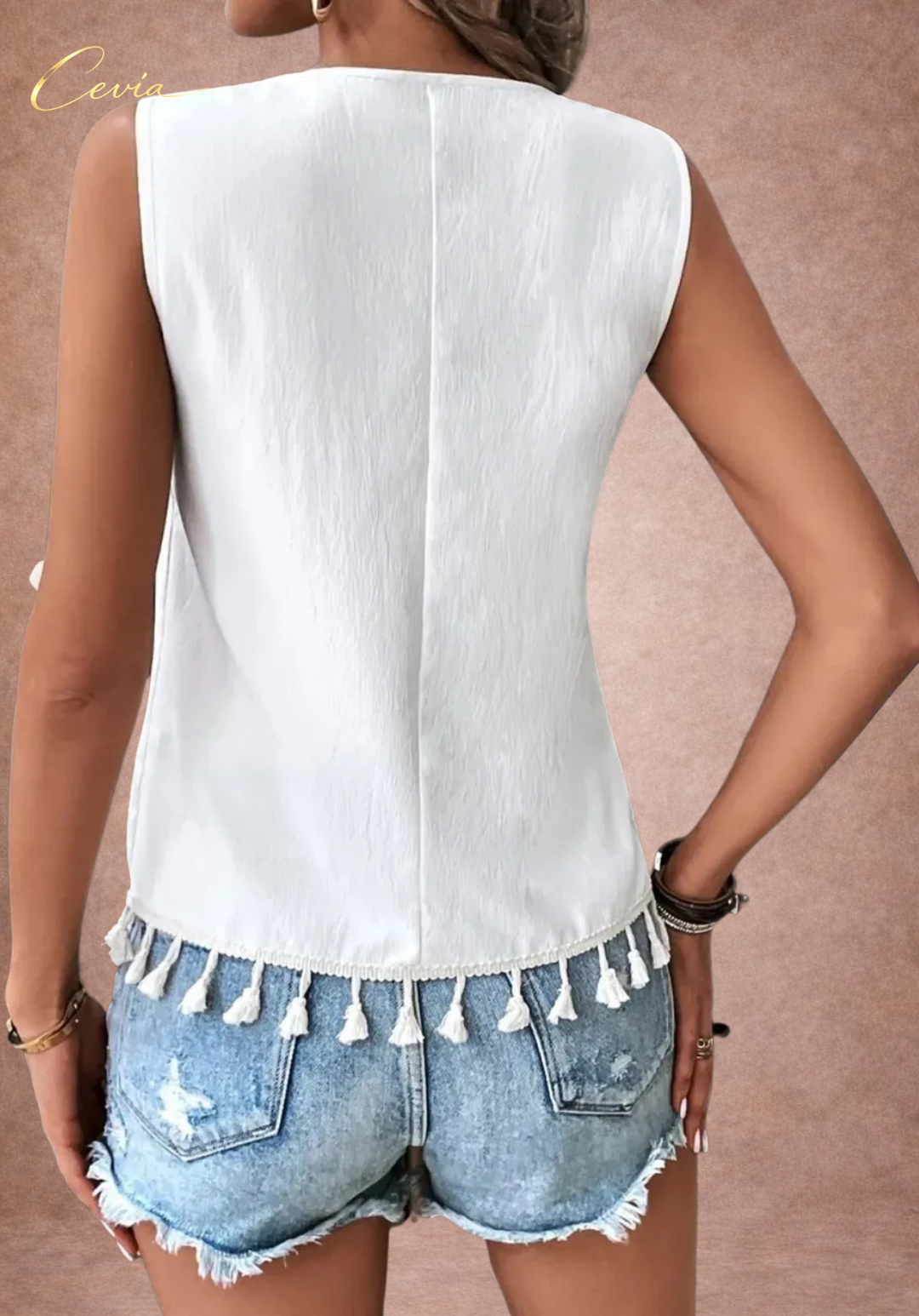 The Bohemian Riviera Tassel Blouse